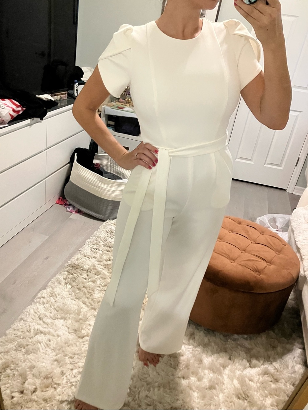 Elegant Calvin Klein White Puff-Sleeve Jumpsuit with Waist Tie